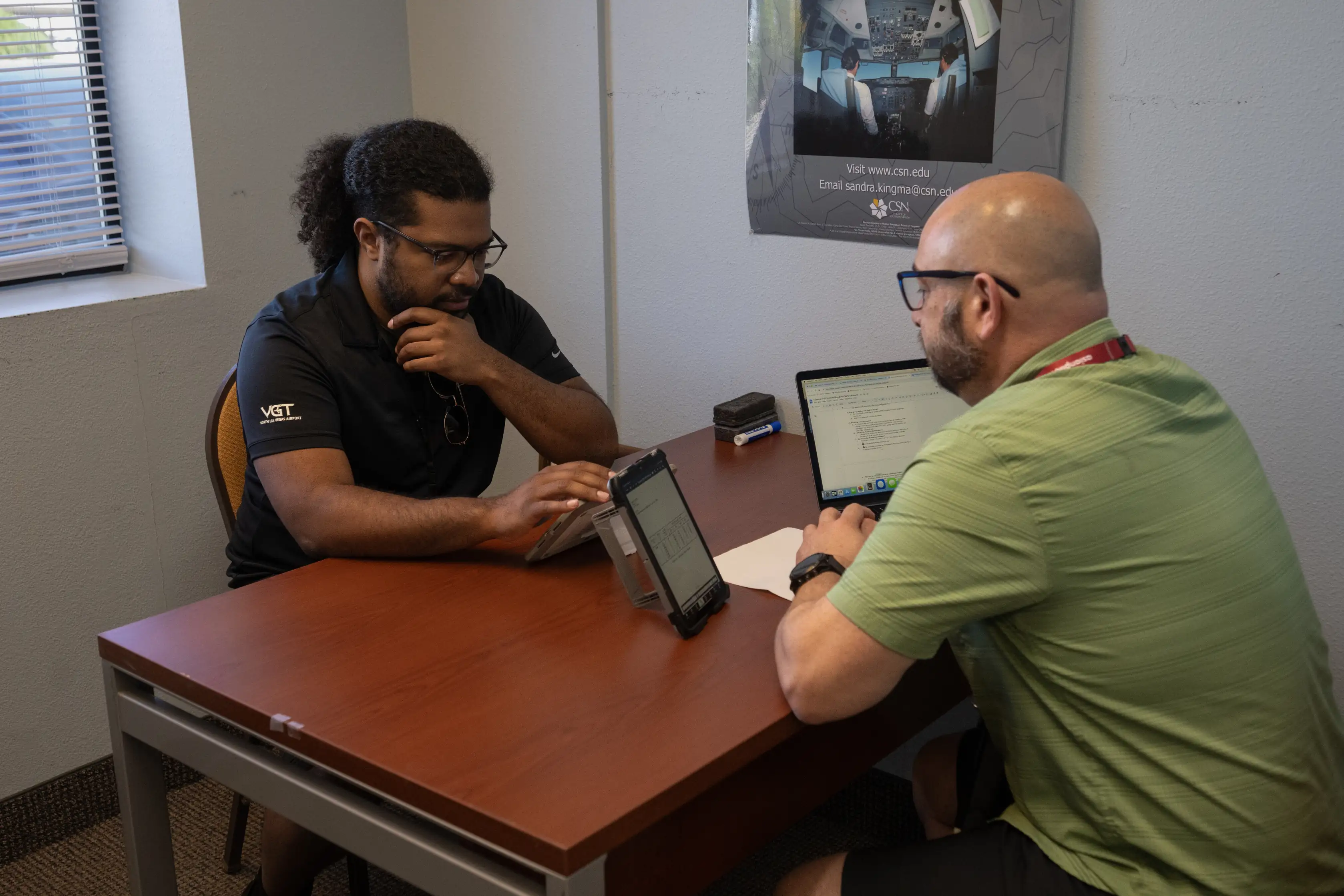 Student and CFI on a study session indoors